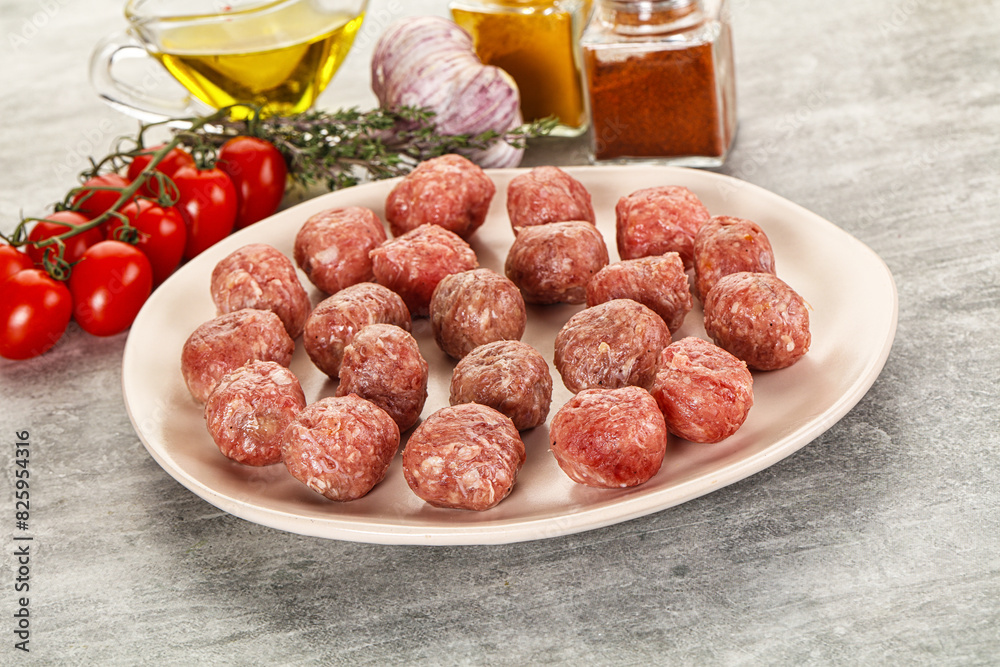 Uncooked raw beef meatball minced Uncooked raw beef meatball minced