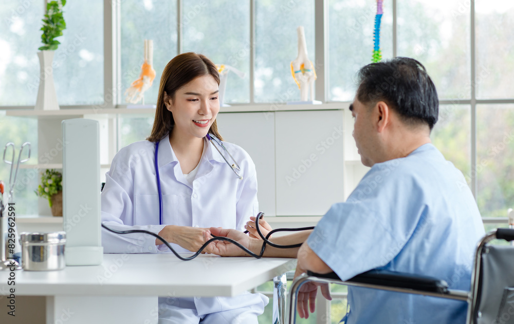 Asian woman doctor using tonometer measuring stethoscope checking blood pressure of elderly patient man checkup in hospital, medicine, healthcare and people concept Asian woman doctor using tonometer measuring stethoscope checking blood pressure of elderly patient man checkup in hospital, medicine, healthcare and people concept