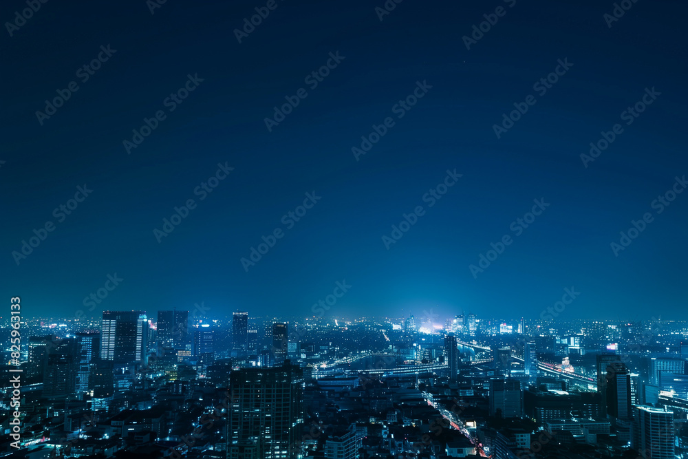 Obraz premium Aerial Night View of Skyscrapers from Drone's Perspective