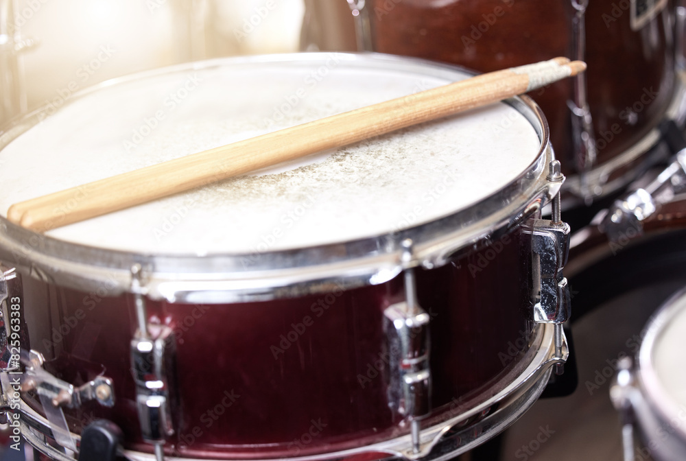 Closeup, drum and drumsticks in music studio for performance, recording and live show on stage. Percussion, snare and band equipment with instruments at event, party and talent for entertainment Closeup, drum and drumsticks in music studio for performance, recording and live show on stage. Percussion, snare and band equipment with instruments at event, party and talent for entertainment