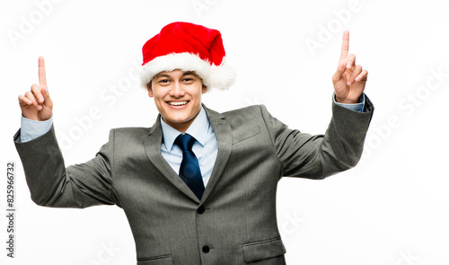 Business man, portrait and celebration for Christmas in studio in office for vacation or holiday with smile. Consultant, happy and success or achievement with promotion, bonus and corporate party