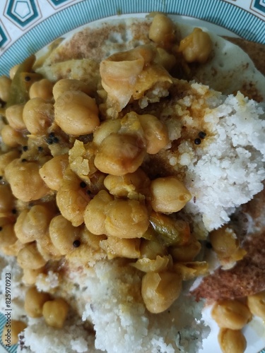 yummy traditional breakfast, puttu with kadalacurry photo