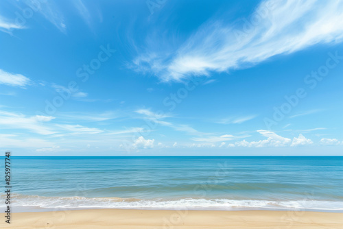 Sunlit Beach with Blue Sky and Ocean View