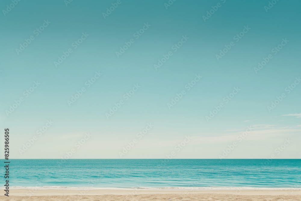 Fototapeta premium Sunny Beach with Blue Sky and Ocean View