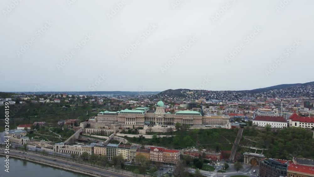 Panoramic view on skyline of Budapest. Grand Buda Castle in capital of Hungary. Historical architecture in Europe Panoramic view on skyline of Budapest. Grand Buda Castle in capital of Hungary. Historical architecture in Europe