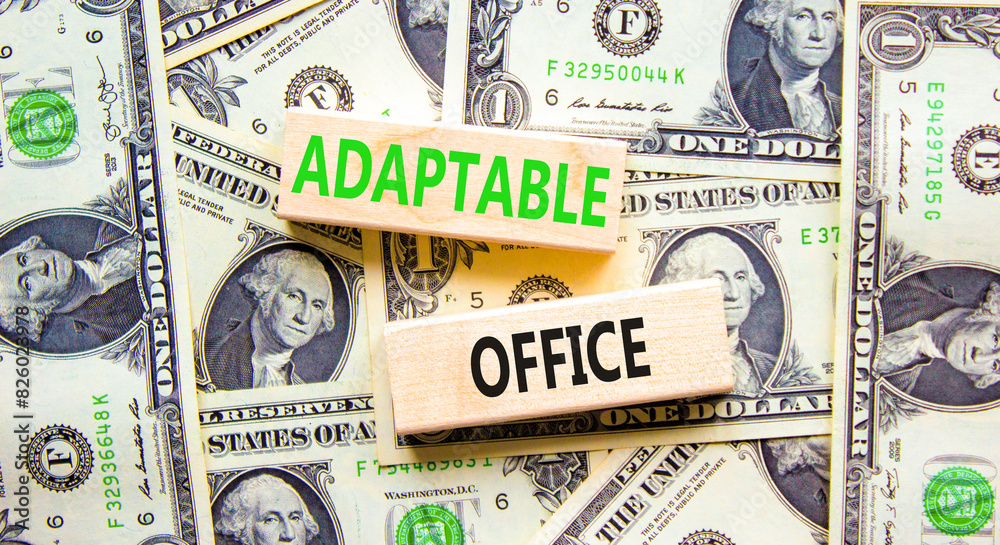 Adaptable office symbol. Concept words Adaptable office on beautiful wooden block. Beautiful dollar bills background. Dollar bills. Business Adaptable office concept. Copy space.