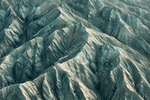 Wallpaper Mural Minimalist aerial view of mountain ridges, showcasing sharp lines and natural patterns in the terrain.  Torontodigital.ca