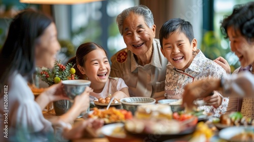 Family Enjoying Festive Dinner Together - Multigenerational Asian Celebration