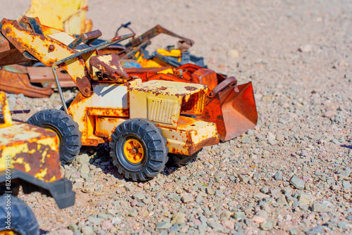 Toy Excavator On a Gravel Surface