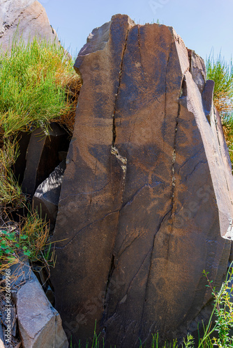 Tamgaly, a petroglyph site in the Zhetysu of Kazakhstan, a UNESCO World Heritage Site. Petroglyphs of Group III of the site.  photo