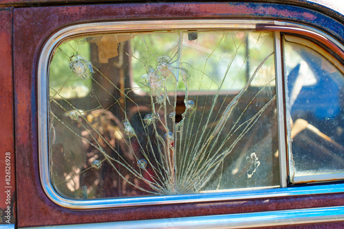 Broken Side Window of a Vintage Car
