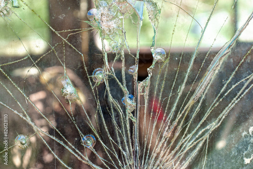 Shattered Side Window of a Vintage Car