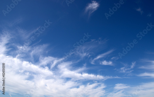 White fluffy clouds in the blue sky.