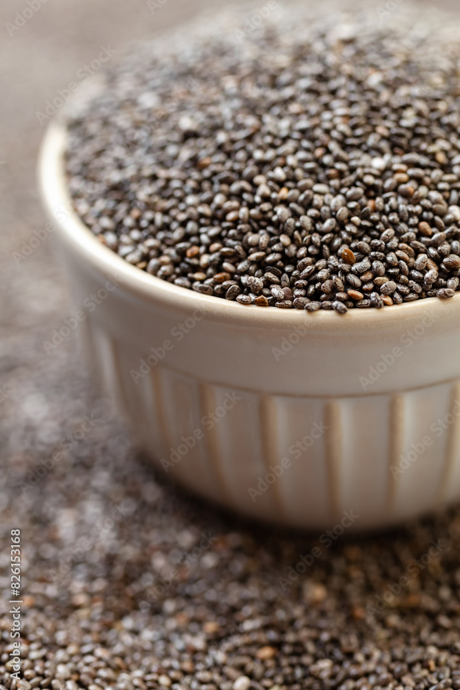 Chia seeds in bowl. Dry healthy supplement for proper nutrition. Chia seeds in bowl. Dry healthy supplement for proper nutrition.