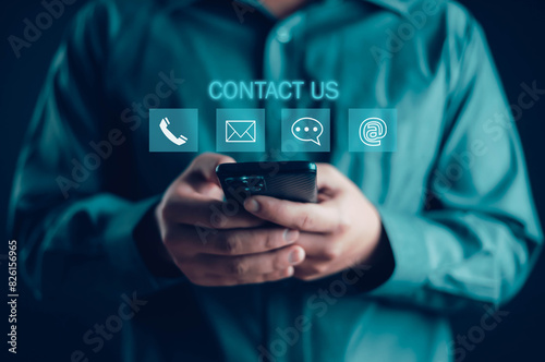 Businessman using telephone contact icon, contact us or connect customer support hotline, contact, customer, phone, support, online, customer support concept. copy space