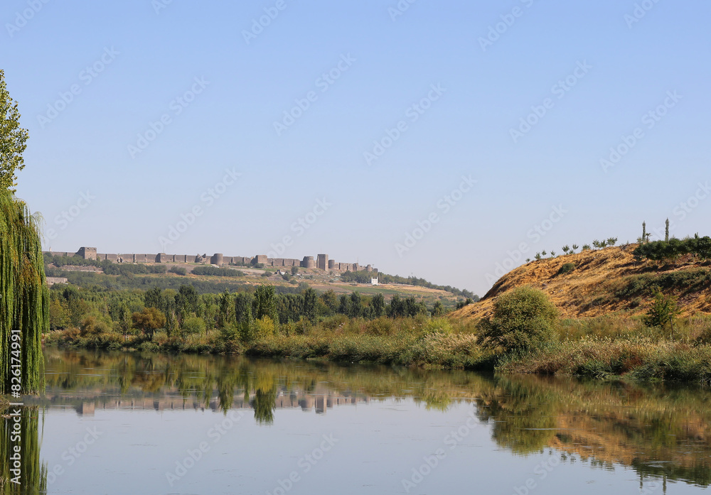 Diyarbakir Castle from The Historic Dicle Bridge with the river Tigris in Diyarbakir, Turkey
