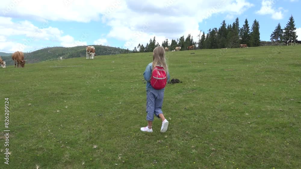 Farmer Child Pasturing Cows, Cowherd Kid with Cattle on Meadow in Mountains, Tourist Little Girl Outdoor with Animals in Nature Farmer Child Pasturing Cows, Cowherd Kid with Cattle on Meadow in Mountains, Tourist Little Girl Outdoor with Animals in Nature