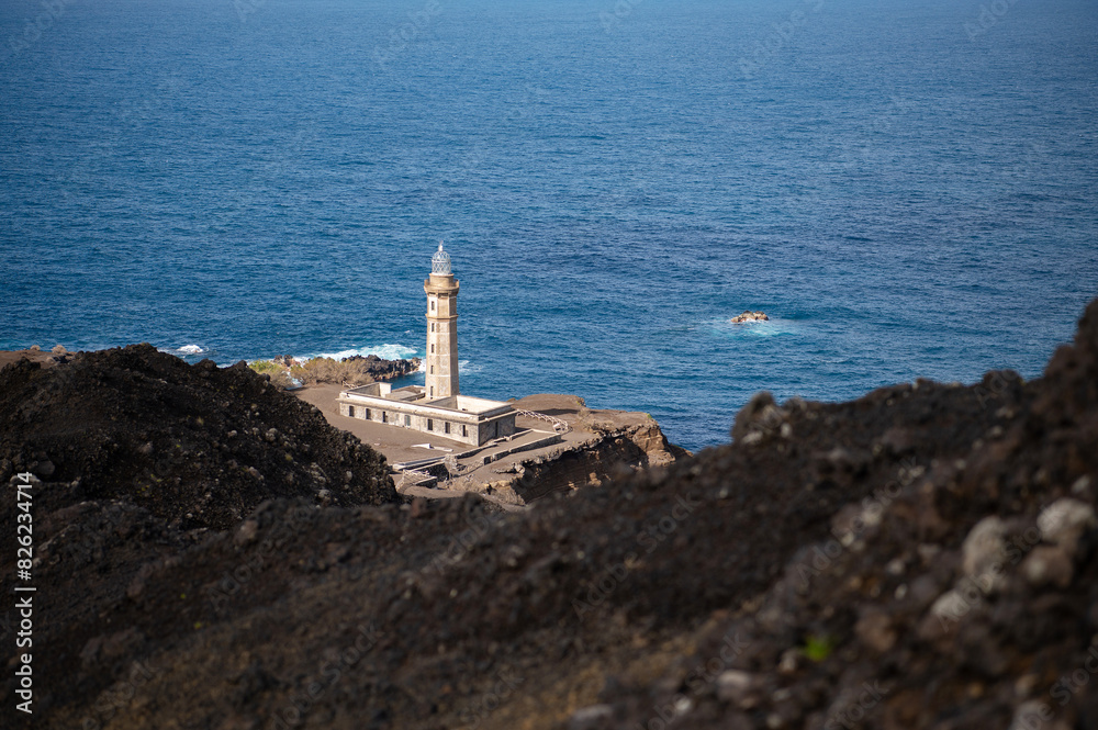 Farol da Ponta dos Capelinhos lighthouse at Faial island of the Azores ...