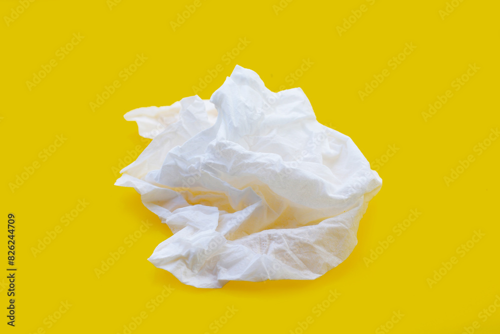 Facial tissue on blue background.