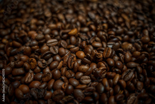 Colorful background with coffee beans in close-up