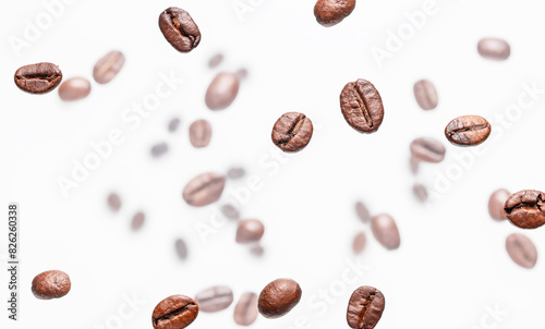 roasted coffee beans on white background. top view