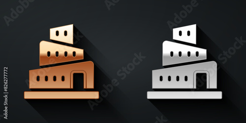 Gold and silver Babel tower bible story icon isolated on black background. Long shadow style. Vector