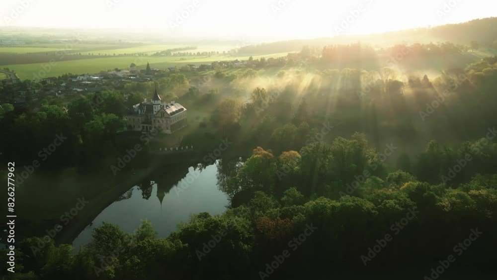 Aerial view of Raduň Castle drowning in fog and the glow of the morning sun Aerial view of Raduň Castle drowning in fog and the glow of the morning sun