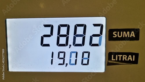 Digital display show fuel price euros per liter, close up view photo