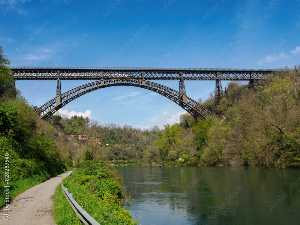 Fototapeta premium Iron bridge over Adda river at Paderno