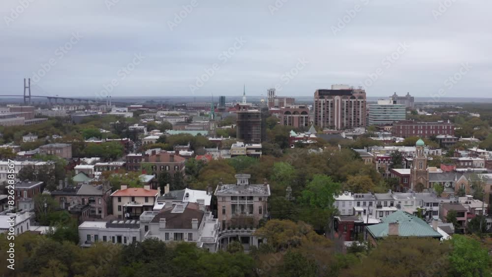 Low aerial dolly shot of downtown Savannah from Forsyth Park in Georgia. 4K Low aerial dolly shot of downtown Savannah from Forsyth Park in Georgia. 4K