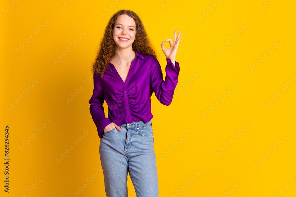Photo portrait of lovely young lady show okey approve dressed stylish violet garment isolated on yellow color background