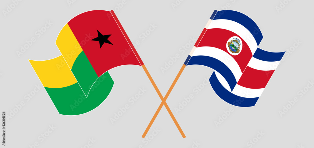 Crossed and waving flags of Guinea-Bissau and Costa Rica Crossed and waving flags of Guinea-Bissau and Costa Rica
