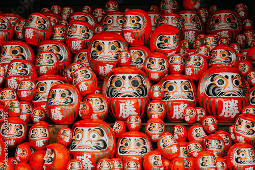 Close-up of the traditional Daruma dolls displayed