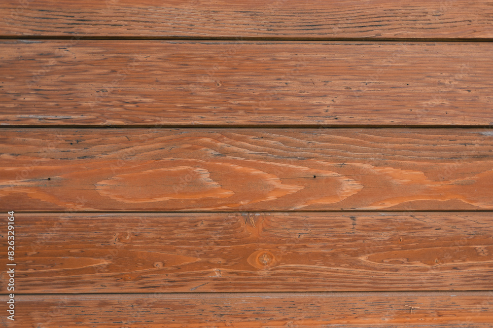 an old weathered wood paneled wall showing some faded peeling an old weathered wood paneled wall showing some faded peeling