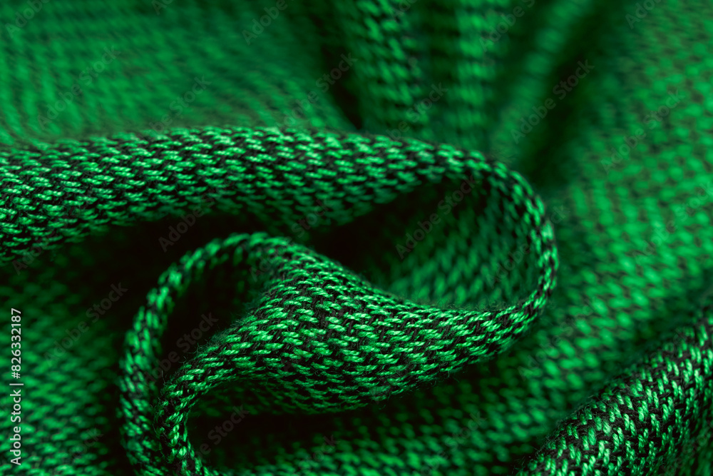 Obraz premium Close-up of green knitted fabric texture