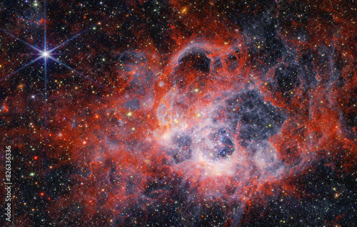 NGC 604 starforming nebula in the nearby Triangulum galaxy by nasa photo