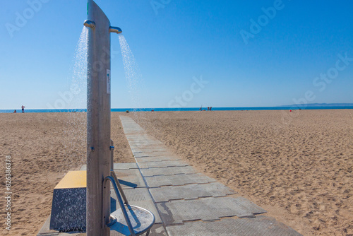 Fototapeta Naklejka Na Ścianę i Meble -  shower on the beach