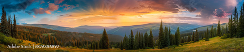 Background banner panoramic view of the sunrise over the mountains in a proportion of 125 by 27.