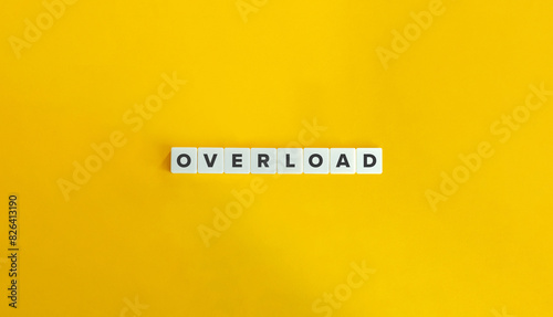 Overload Word and Banner. Block Letter Tiles on Flat Background. Minimalist Aesthetics. photo