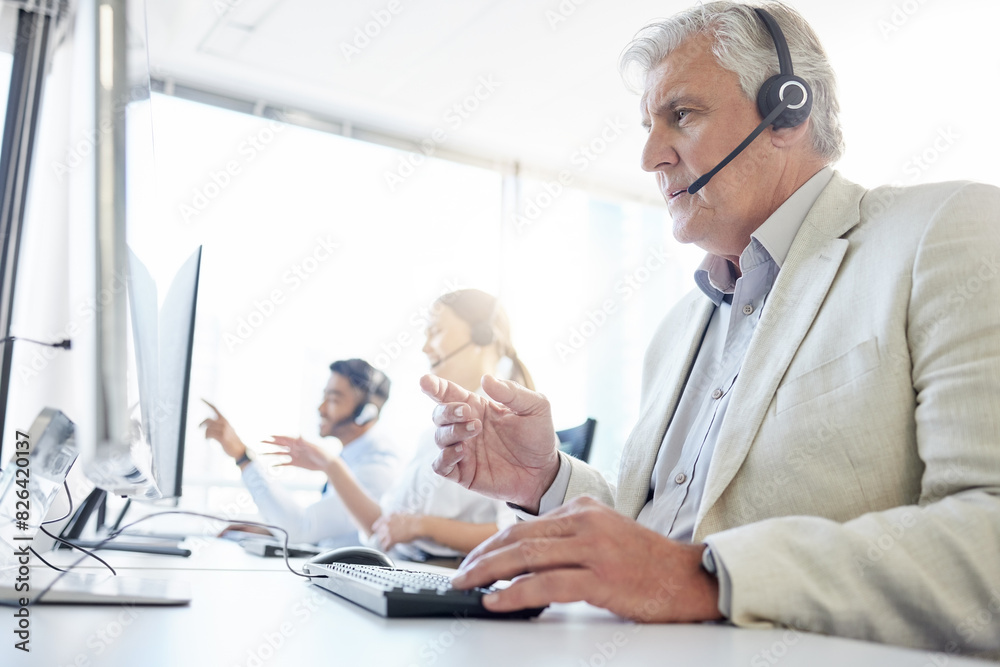 Mature, businessman and headphone for conversation, consulting and communication in office. Male person, computer and telemarketing agent in workplace for talking, customer service and support