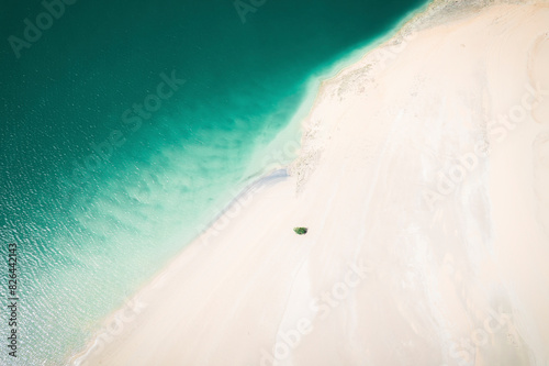 Aerial view of Willies Creek with low tide, white sand, and trees, Waterbank, Western Australia, Australia. photo