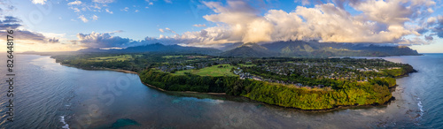 Aerial view of coastal landscape with mountain peak in Princeville, Kauai, United States. photo