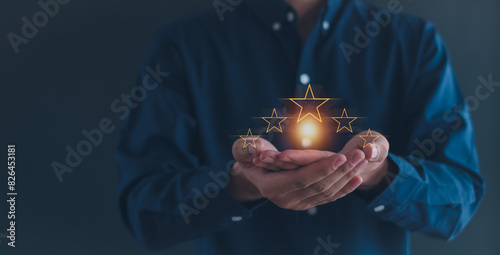 Customer service experience and business satisfaction survey, close up hand using smart phone and give five star symbol to increase rating of product and service concept.