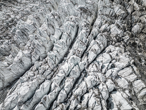 Aerial view of majestic Rakhiot glacier with details and crevasses, Astore, Skardu, Gilgit-Baltistan, Pakistan. photo