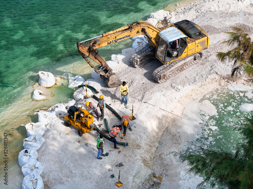 Aerial view of construction and dredging project in Addu Atoll, Maldives. photo