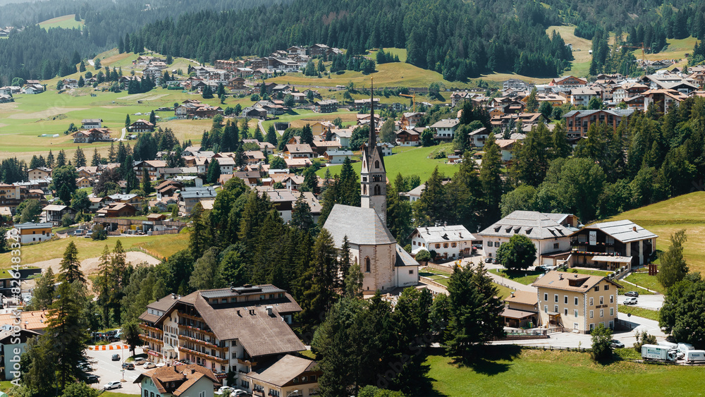 Aerial view of Church and Dolomiti in San Giovanni di Fassa, Trentino, Italy. Aerial view of Church and Dolomiti in San Giovanni di Fassa, Trentino, Italy.