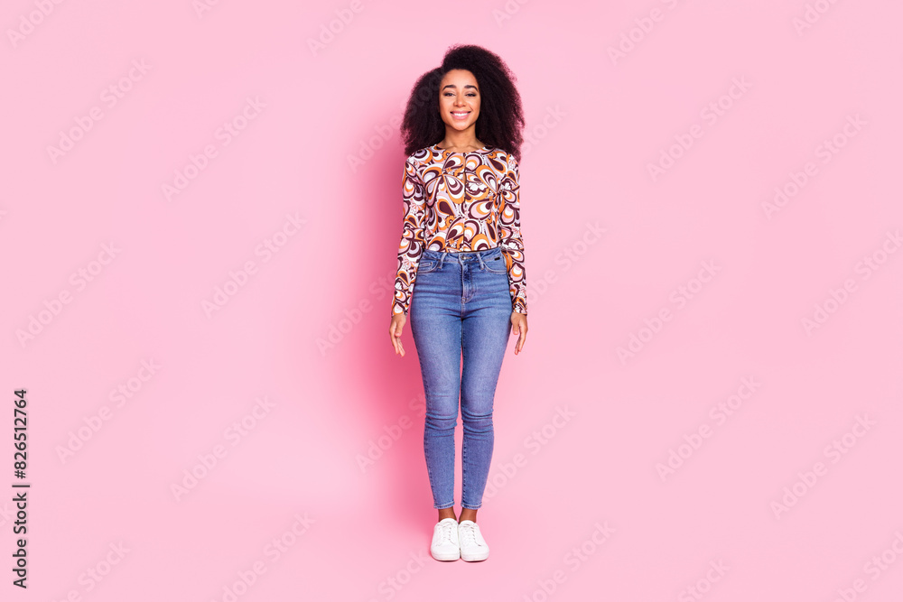 Full length photo of charming girly woman wear print shirt smiling empty space isolated pink color background Full length photo of charming girly woman wear print shirt smiling empty space isolated pink color background