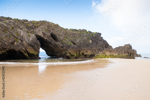 Rock formation in San Antolin beach, Spain photo