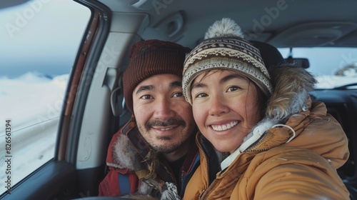 Selfie family in car during winter road trip