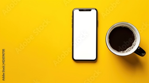 A digital photo of a smartphone with a blank white screen and a cup of coffee on a bright yellow solid color background